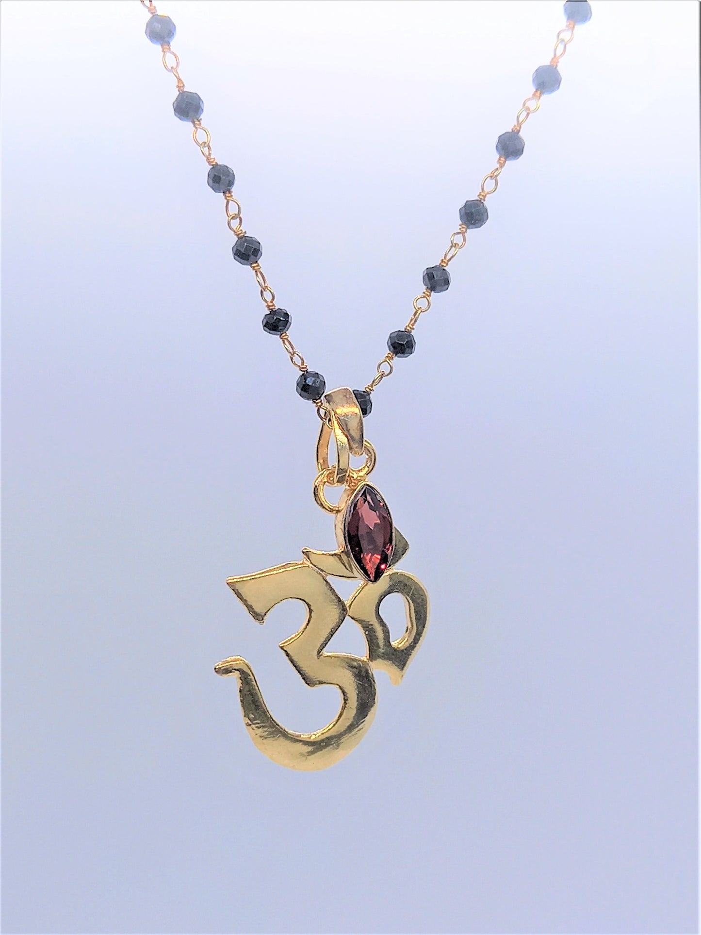 Serenity Jewellery - Om & Garnet on Black Onyx chain