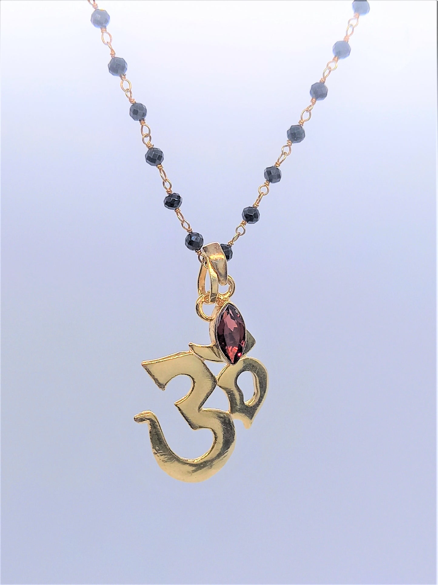 Serenity Jewellery  - Om & Garnet on Black Onyx chain